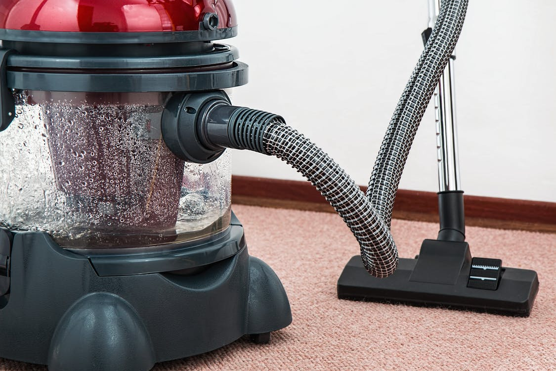 deep cleaning carpet done by residential cleaning services to get rid of odours